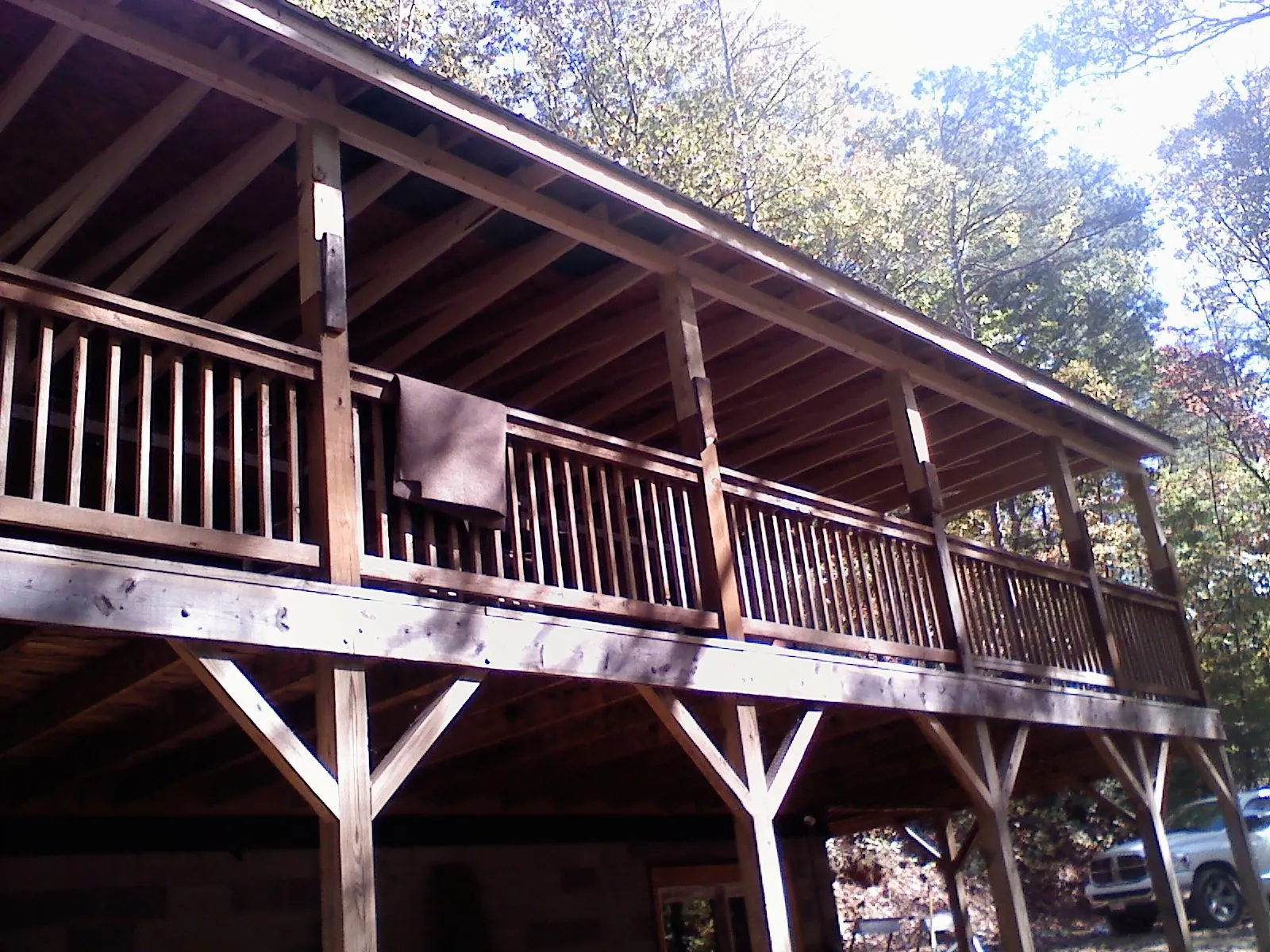 Timber framing under a new elevated porch and deck — Roof Leak Repair in Balaton by Roofing Brothers